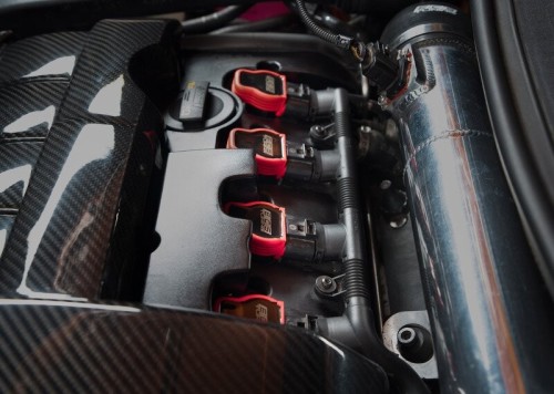 Ignition coil with spark plug cap 7